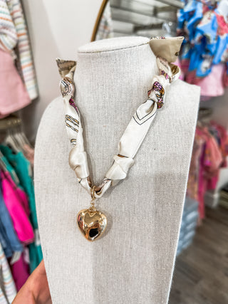 Cream/Neutral Knotted Scarf Necklace W/ Hammered Puffy Heart Charm
