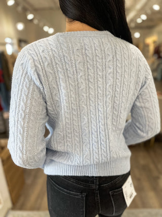 Snowflake Charm Ruffle Sweater