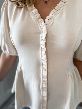 The Lily Pearl Peplum Ruffle Top