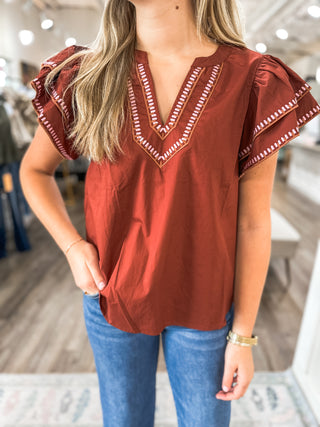 The Madeline Brick Flutter Sleeve Top
