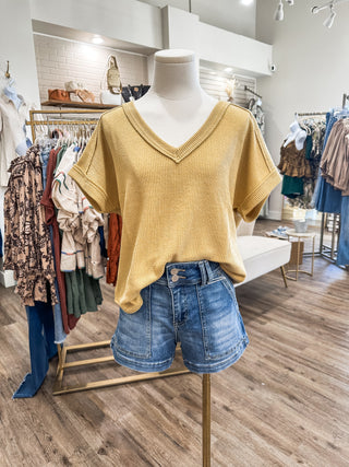 Dusty Yellow Raw Edge V-Neck Extended Short Sleeve Top