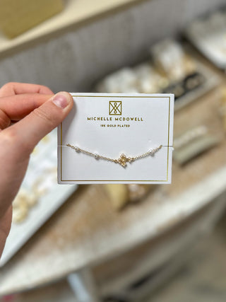 Elara Luxe Cross Gold & Pearl Bracelet